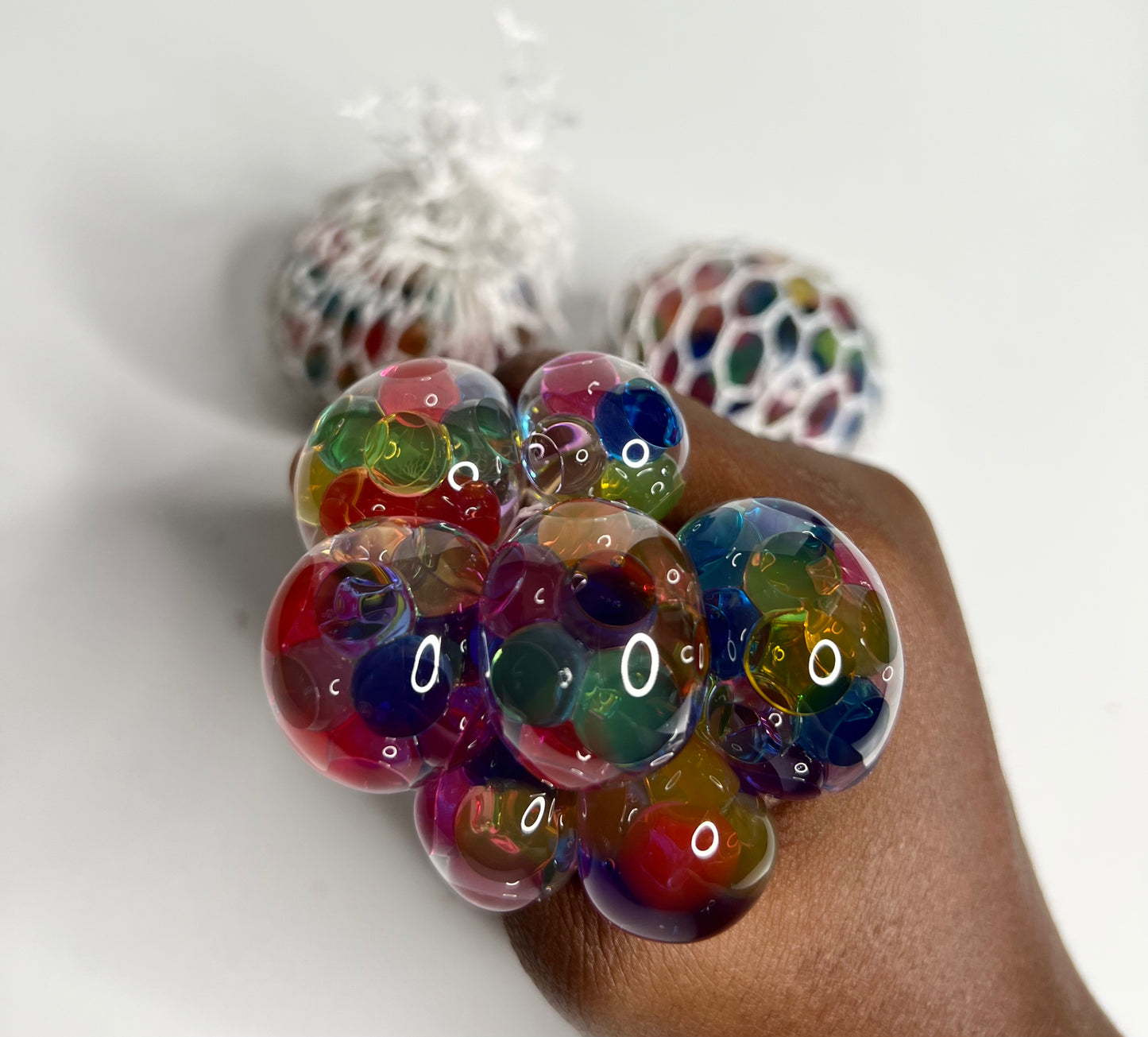<img src="Mesh Squeeze Ball Fidget Toy" alt="Mesh squeeze ball fidget toy">