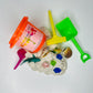 bucket of sensory sand with toys 