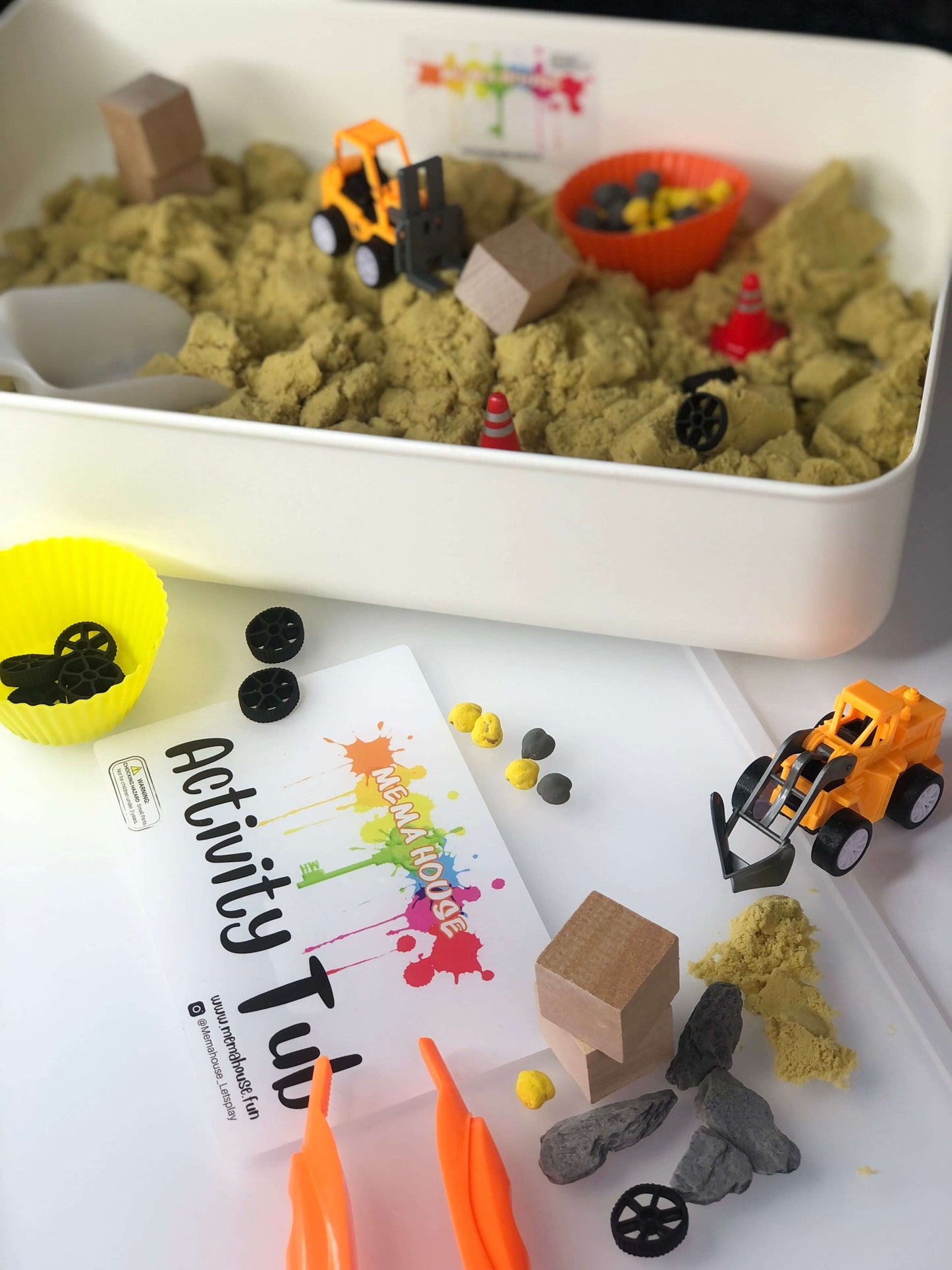 <img src="construction theme sensory play" alt="construction theme sensory kit">